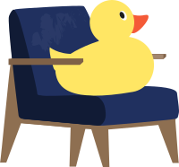 Un petit canard en plastique posé sur son fauteuil. Mais, c'est quoi ce canard ?